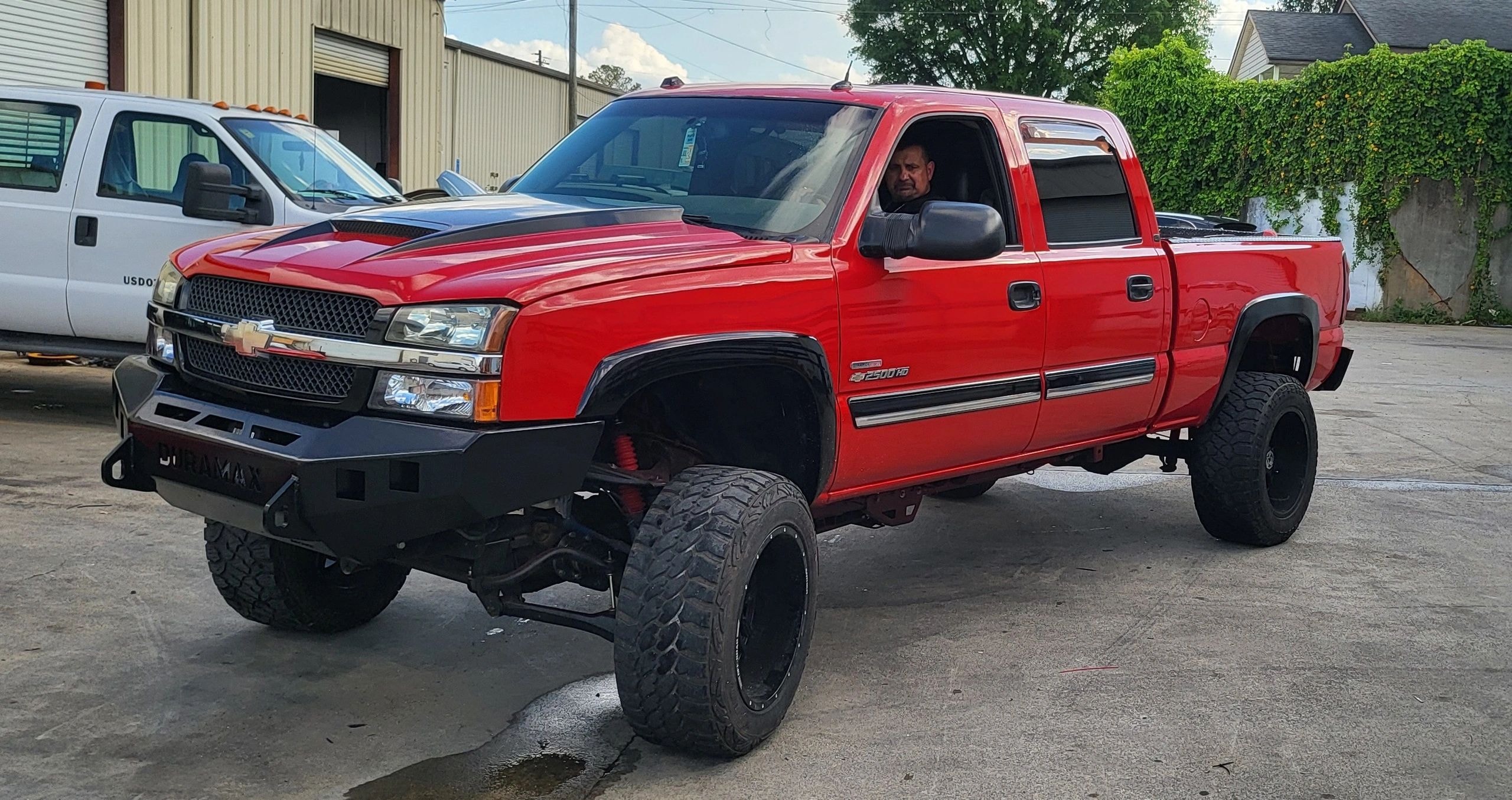 Completed custom paint job on Chevy HD 2500 pickup truck — auto body restoration by C.A.R.S Cartersville GA